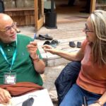 Suzanne and Michael sitting in conversation
