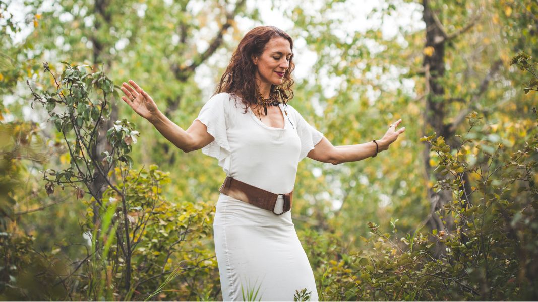 Bettina Roth dancing in a forest